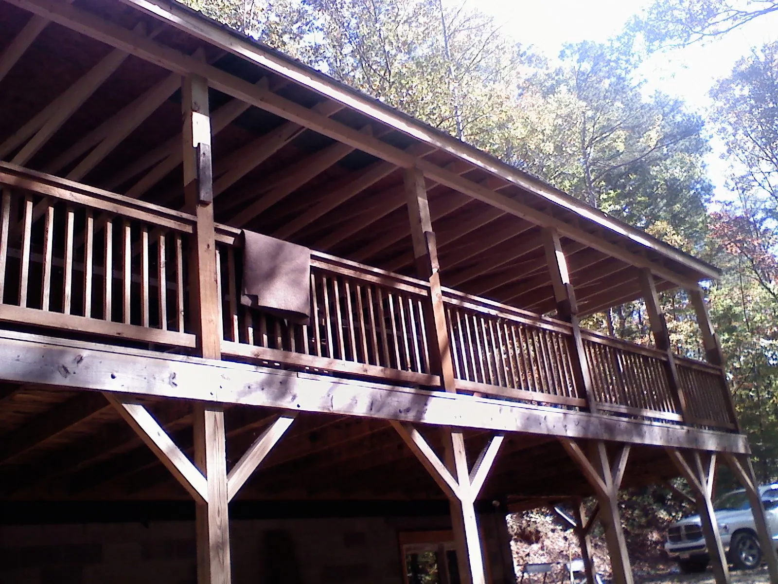 Timber framing under a new elevated porch and deck — Roof Leak Repair in West Terre Haute by Roofing Brothers